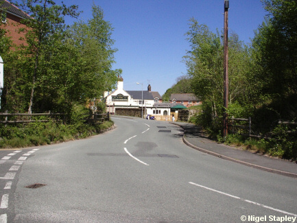 Picture of a road where a bridge used to stand