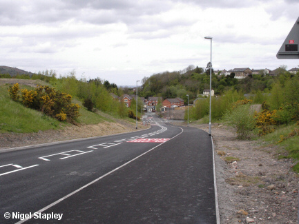 Picture of a long incline on a new road