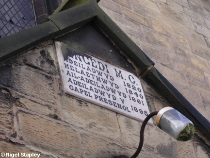 Picture of a plaque over the door of a Welsh chapel