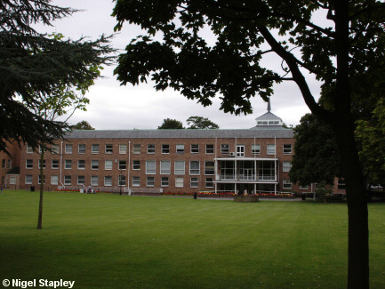 Picture of council offices with a large lawn in front of it