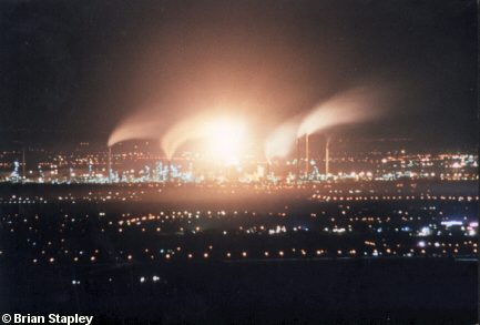 Picture of an oil refinery at night