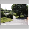 Picture of a road junction by an oak tree