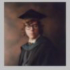 Picture of a young man in graduation robes