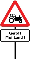 Road sign showing a tractor and the words 'Geroff Moi Land!'