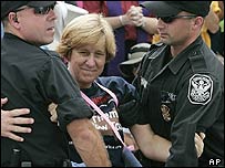 Cindy Sheehan being arrested