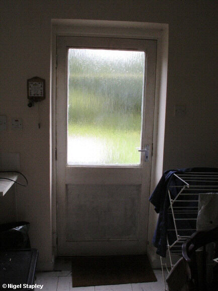 Picture of a grotty old back door - inside