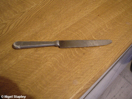 Photo of a metal dinner knife