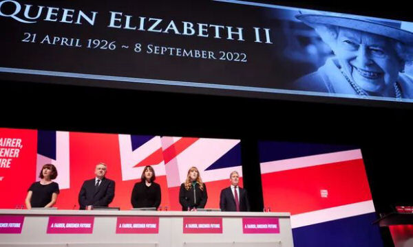 Photo of backdrop at 2022 Labour Party conference: enormous Union Jack and picture of the dead Queen Elizabeth II