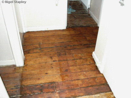 Photo of stained floorboards