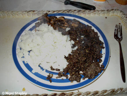 Photo of a plate of fried mushrooms with haggis and mashed potatoes