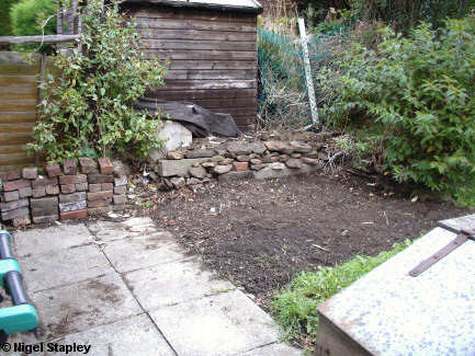 Picture of a square area of bare soil