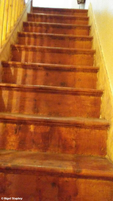 Photo of sanded skirting boards on a staircase
