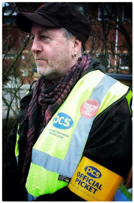 Photo of a man on a picket line